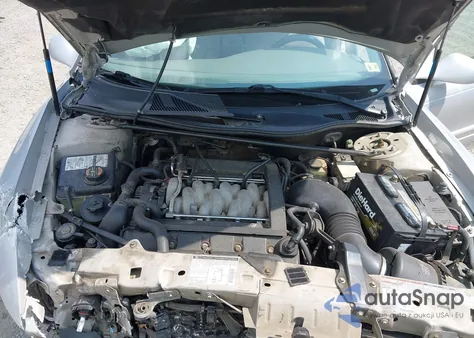 1999 Lincoln Continental из США, поврежденный, VIN 1LNHM97V5XY630004